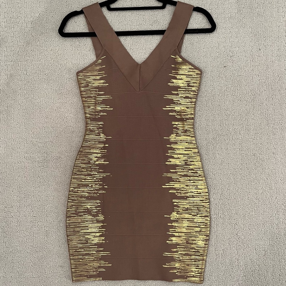Tan Guess Bandage Dress with Gold Metallic Detail on
Sides